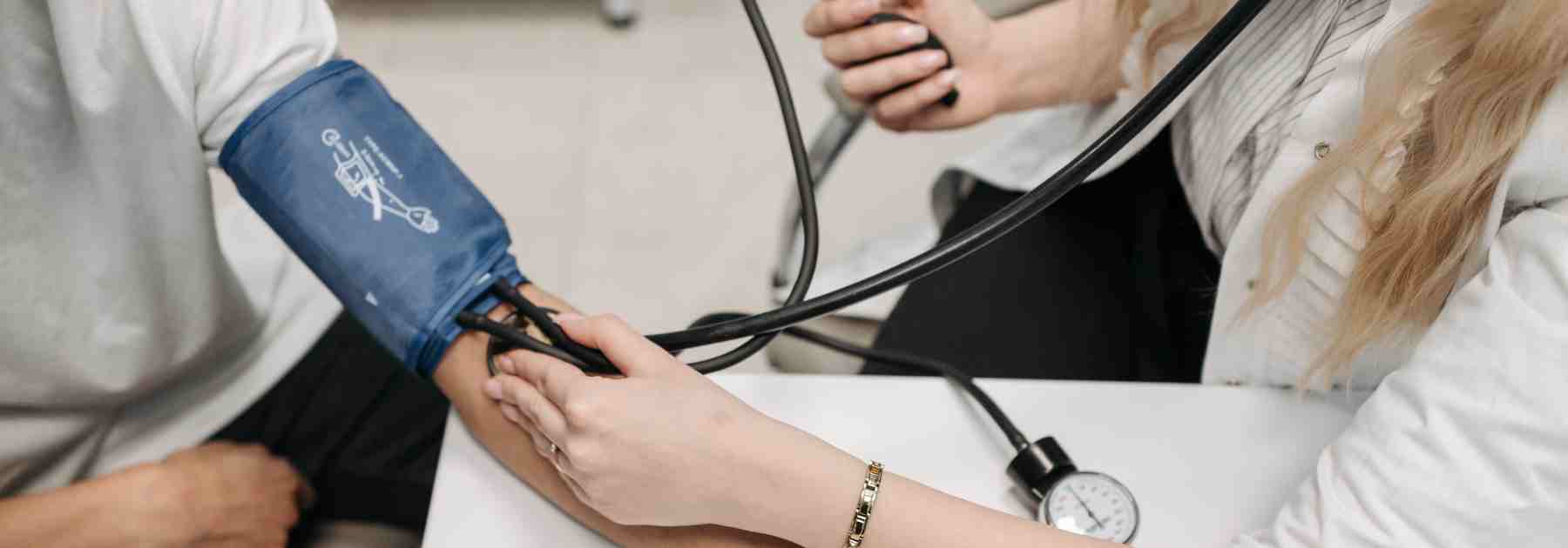 Blood pressure check for hypertension. 